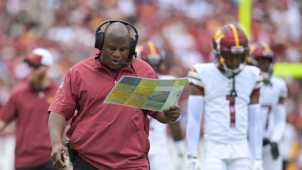 Washington Commanders assistant head coach/offensive coordinator Eric Bieniemy walks down the sidelines during the first half against the Arizona Cardinals at FedExField.
